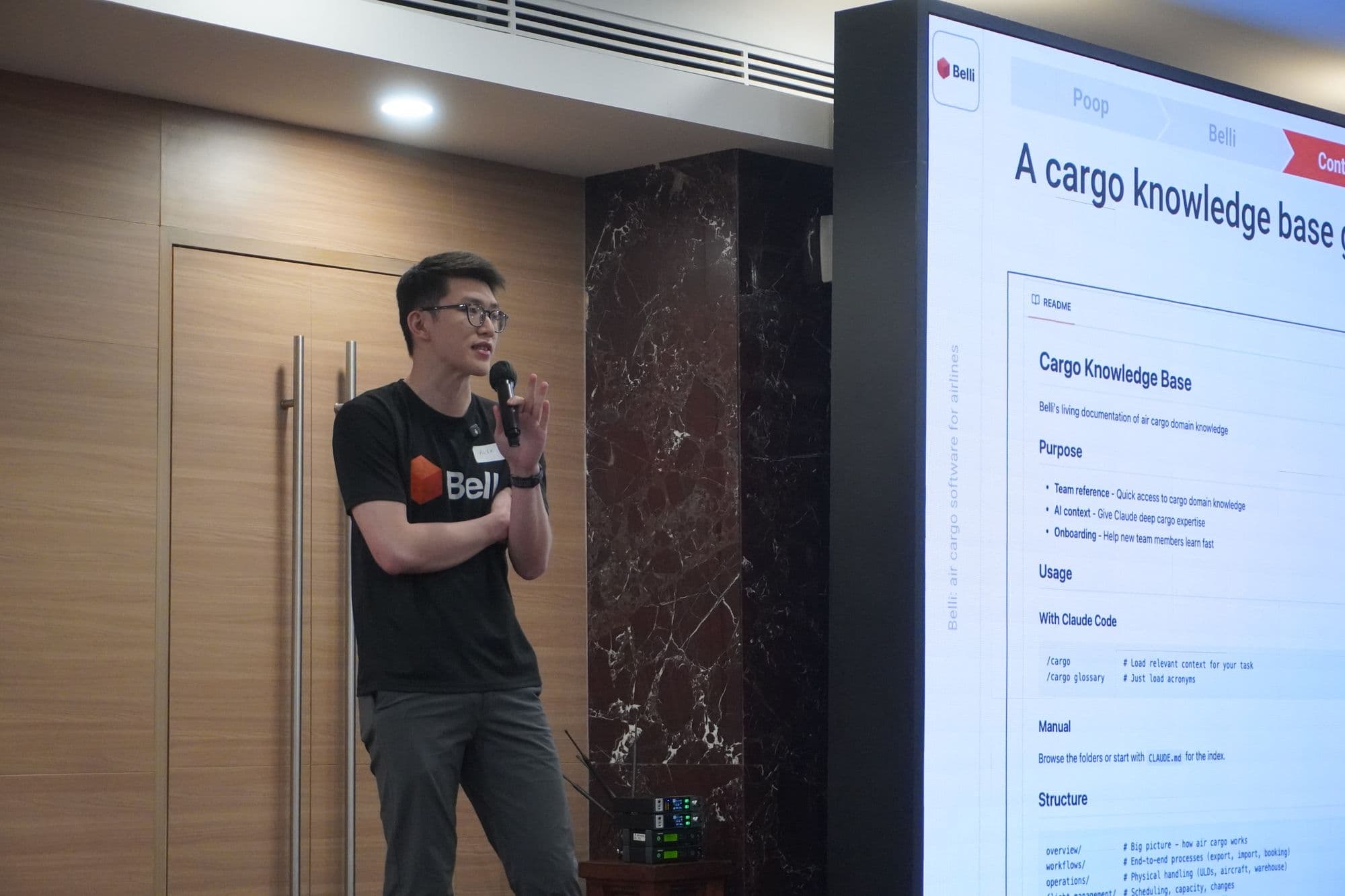 Belli co-founder Alex Khor presenting Belli's cargo knowledge base at the Jakarta AI meetup